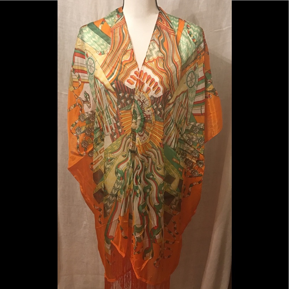 Lovely shawl w/ arm holes in swirly artful pattern